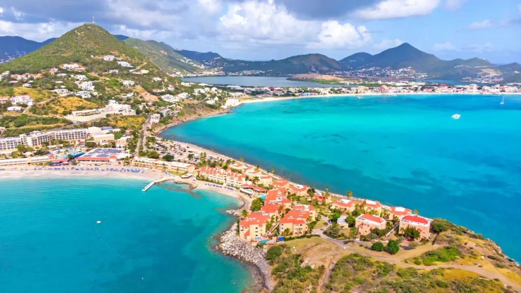 Scenic coastline of Philipsburg, Great Bay and Little Bay with turquoise waters and green hills, St Maarten