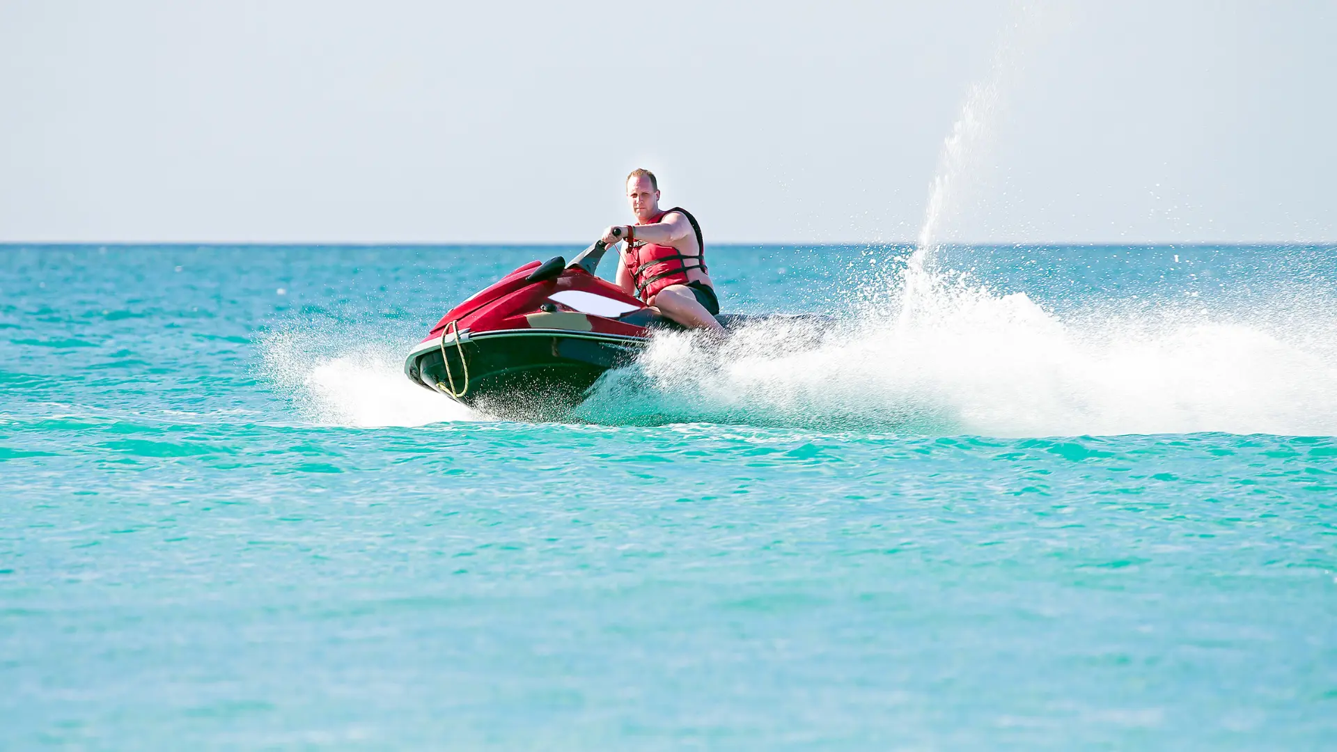 Thrilling jet ski ride in turquoise waters near Great Bay, St Maarten