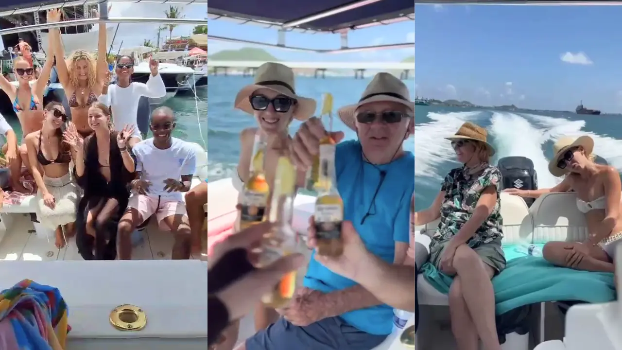 Group of friends raising beer bottles for a toast while seated on a boat. arranged by EXPLR.SX's caribbean concierge