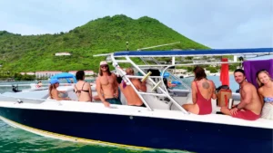 a group enjoys a powerboat private charter cruise in grand case st martin