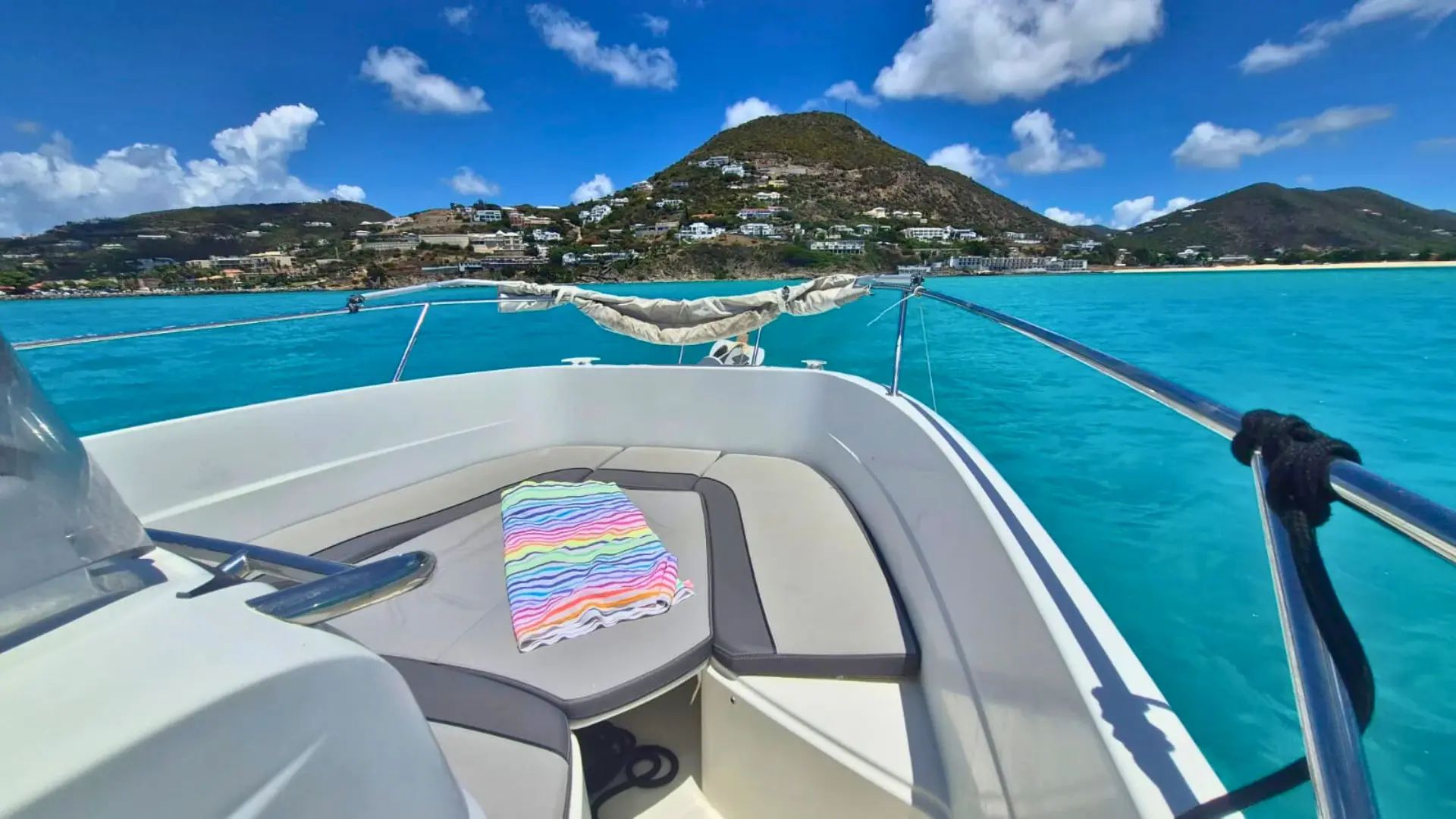 View of Petite Plage and Grand Case from the sea on a private boat charter