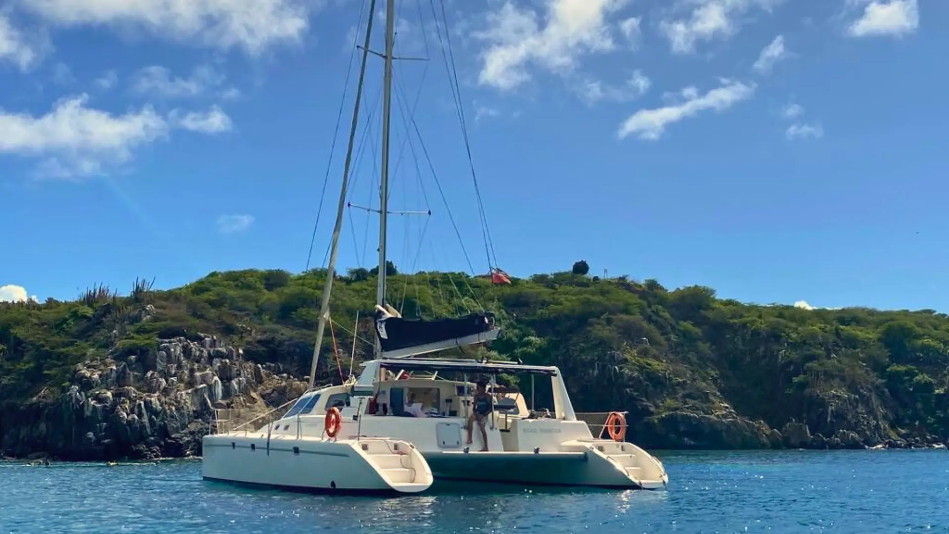 Private catamaran anchored in a sheltered bay in St Maarten