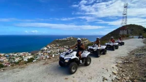 Group ATV tour overlooking Philipsburg and the Caribbean Sea