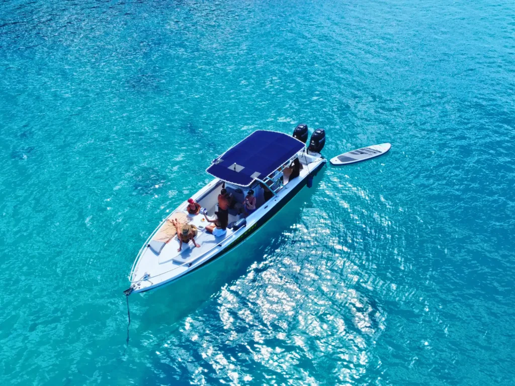 Aerial view of a luxury private boat charter anchored in bright blue waters near St Martin