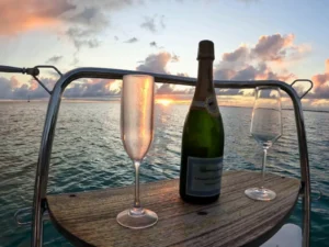Sunset champagne setup on private catamaran cruise in St Martin
