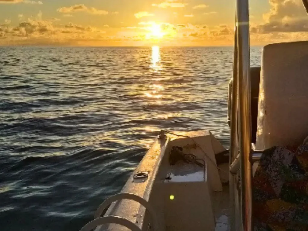 Golden sunset view from a private boat charter off the coast of St Martin