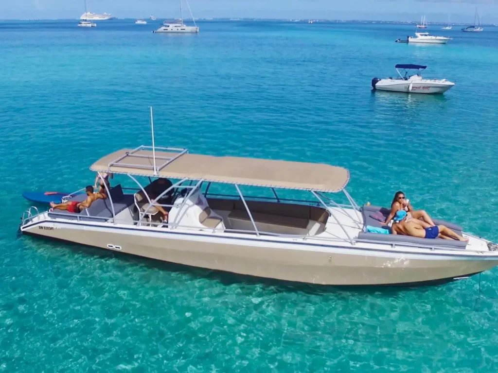 Private powerboat charter in St Martin with spacious shaded seating and swim platform