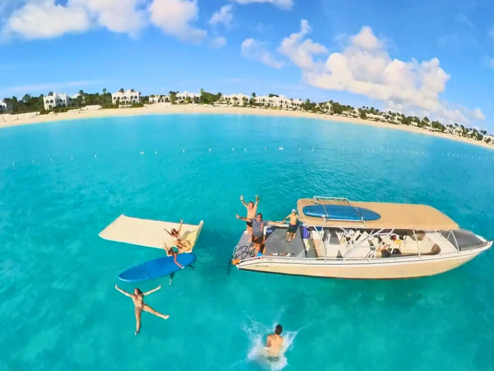 Rear deck sunbed and swim platform on a private powerboat charter in Anguilla