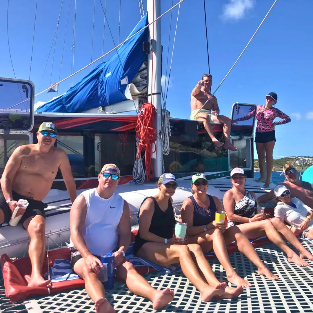 Group relaxing on a catamaran during a St Maarten boat charter