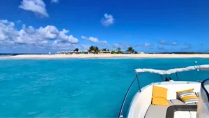 Private boat approaching Anguilla beach during day trip from St Martin