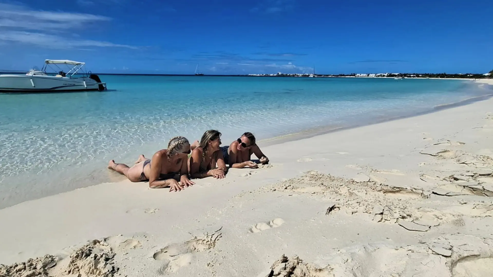 Private boat trip to Anguilla beach stop with white sand and clear water
