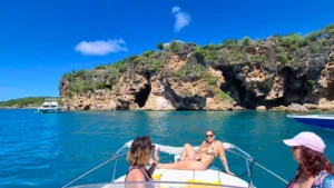 Guests relaxing on private boat charter near Anguilla coastline