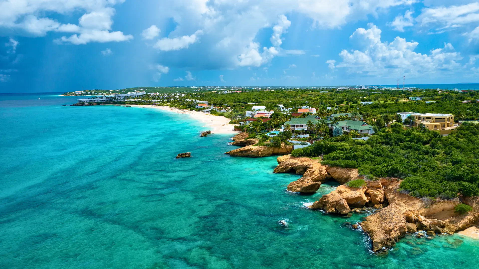 Barnes Bay Anguilla coastline viewed from private boat charter