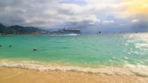 View from beach in Philipsburg St Maarten with cruise ships and turquoise water during private boat excursion