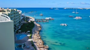 Simpson Bay coastline with boats and clear turquoise water in St Maarten