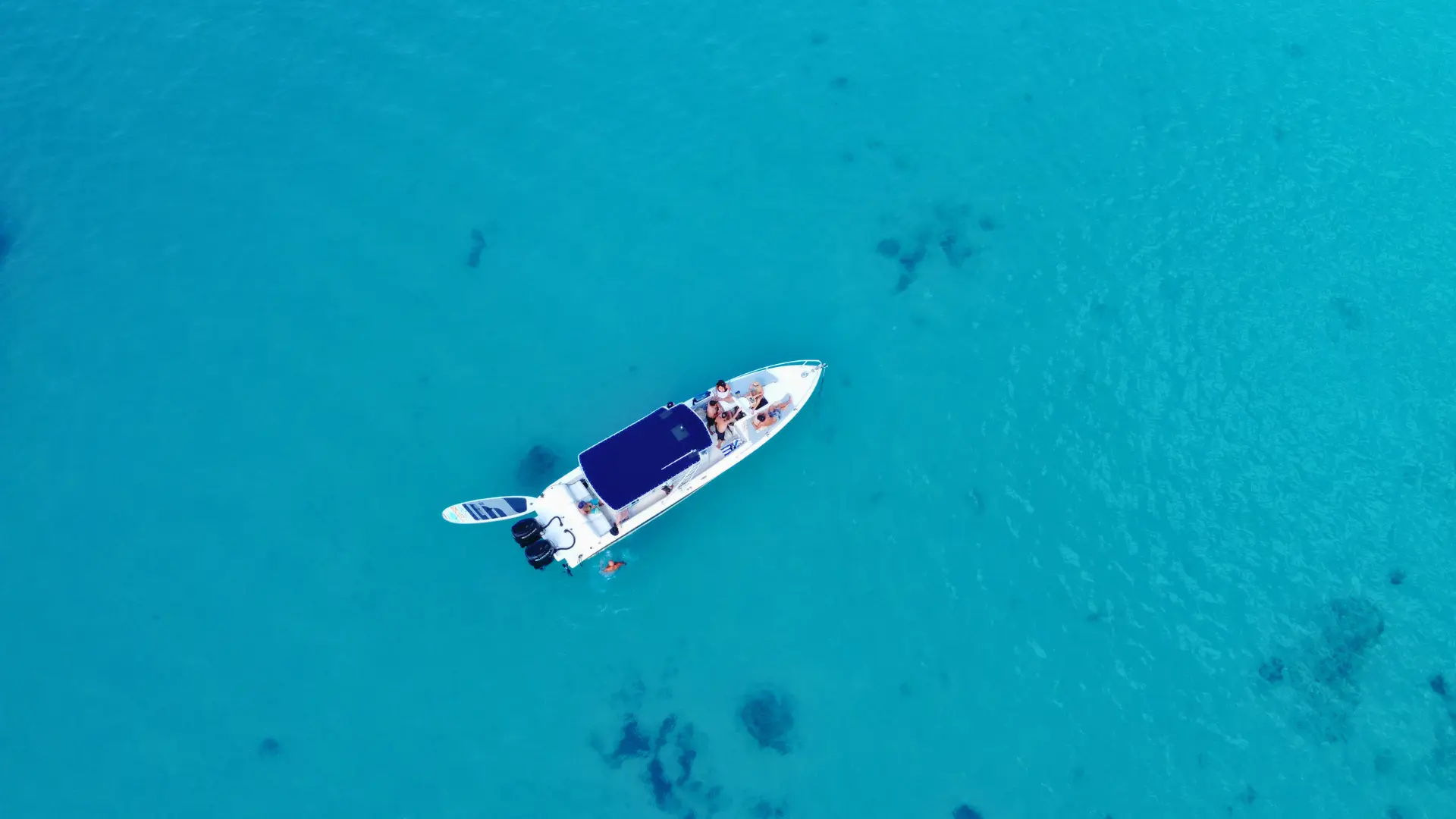 Aerial view of private boat charter in clear blue water near St Maarten