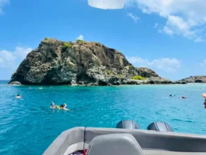 Snorkeling at Creole Rock viewed from a private boat during a St Martin island charter