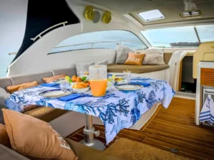 comfortable shaded seating and dining area on private yacht charter st martin caribbean