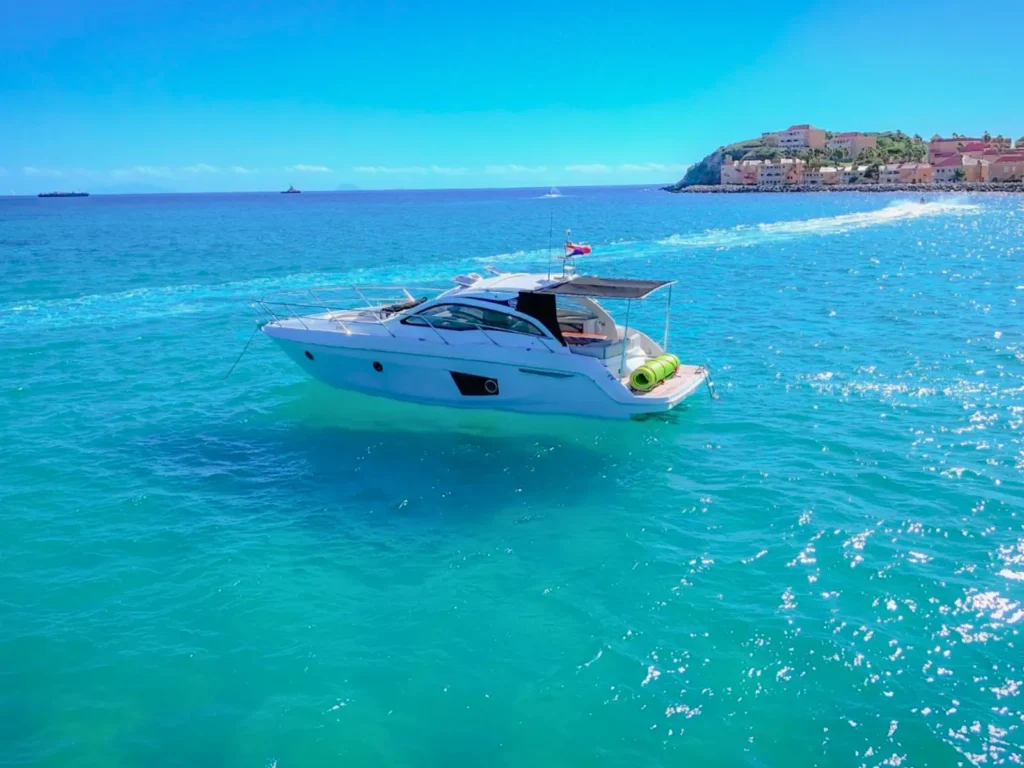 side profile of premium motor yacht on private charter in st maarten caribbean