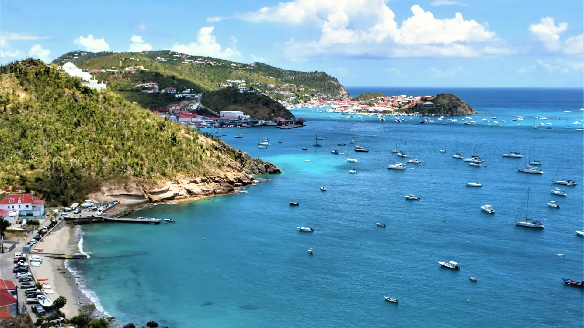 View across Gustavia Harbour in St Barts with yachts anchored in the bay